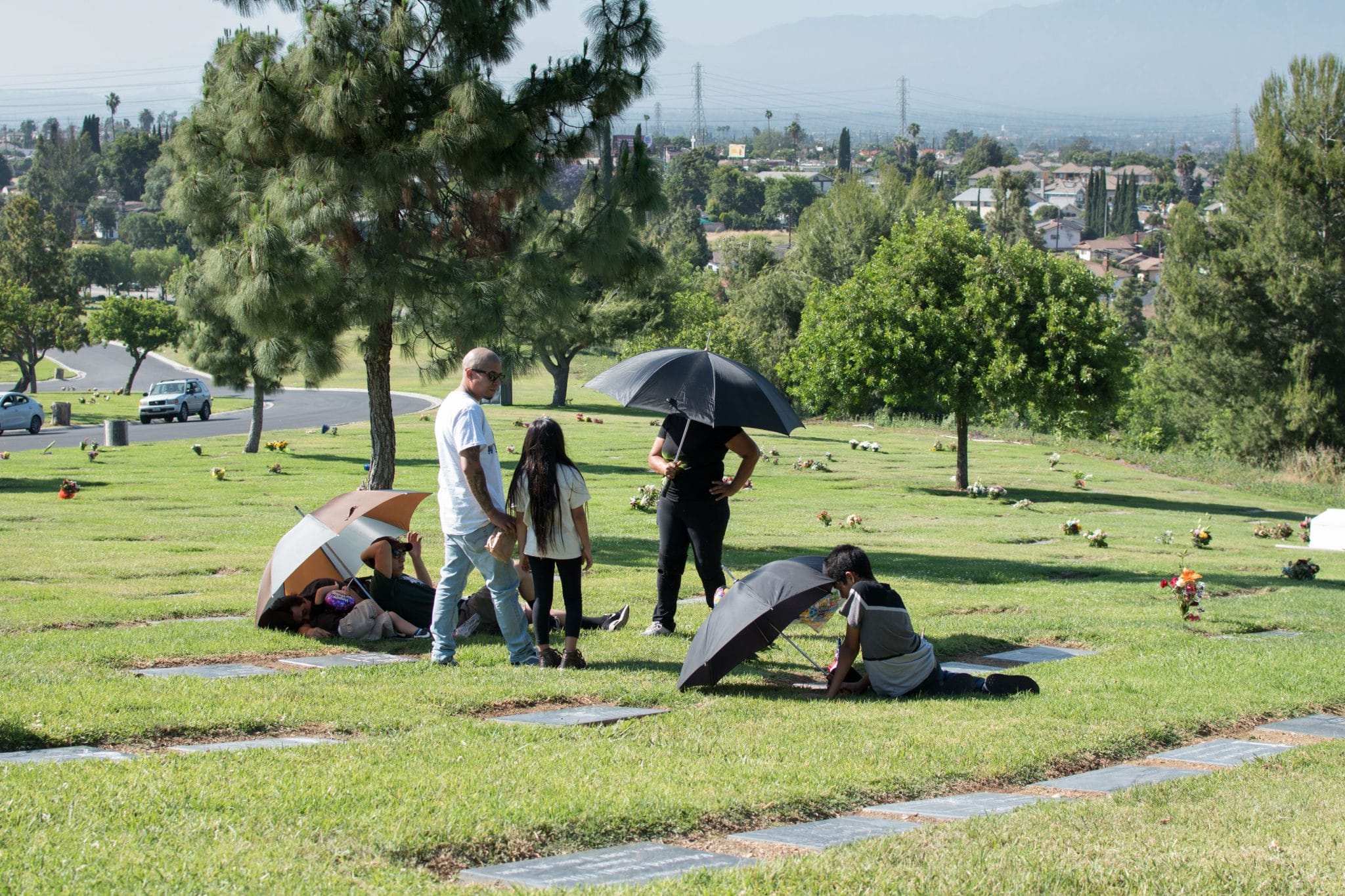 visitors at the Resurrection Cemetery