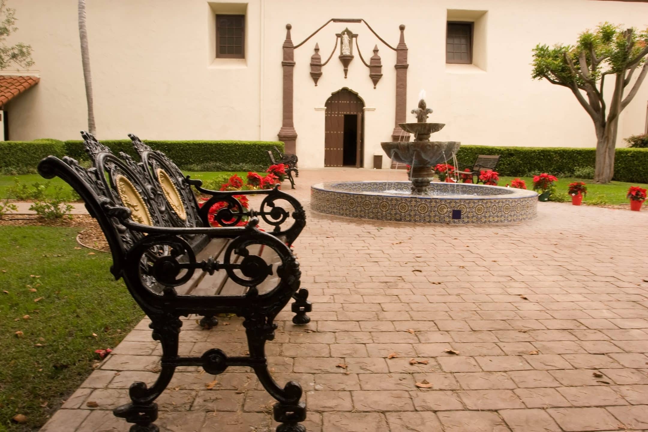 bench and plaza view of san buenaventura mission