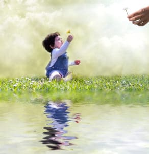 concept of child reaching out with a flower to God