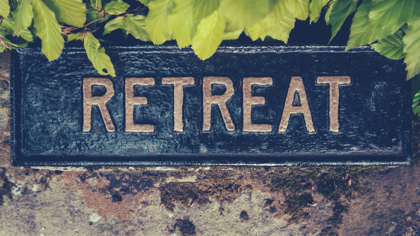 a sign spelling 'Retreat'