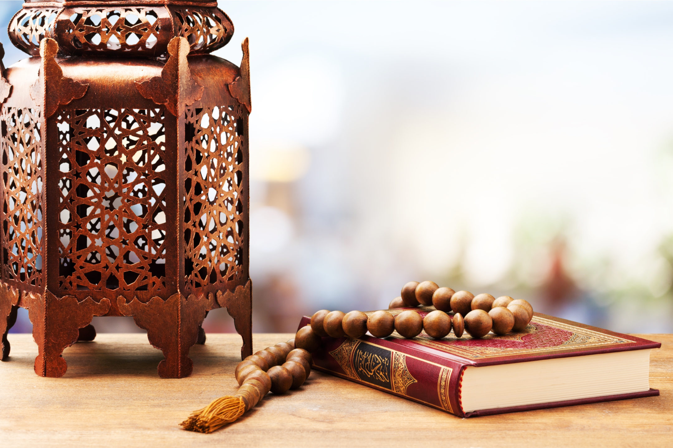 Islamic Holy Book Quran with rosary beads