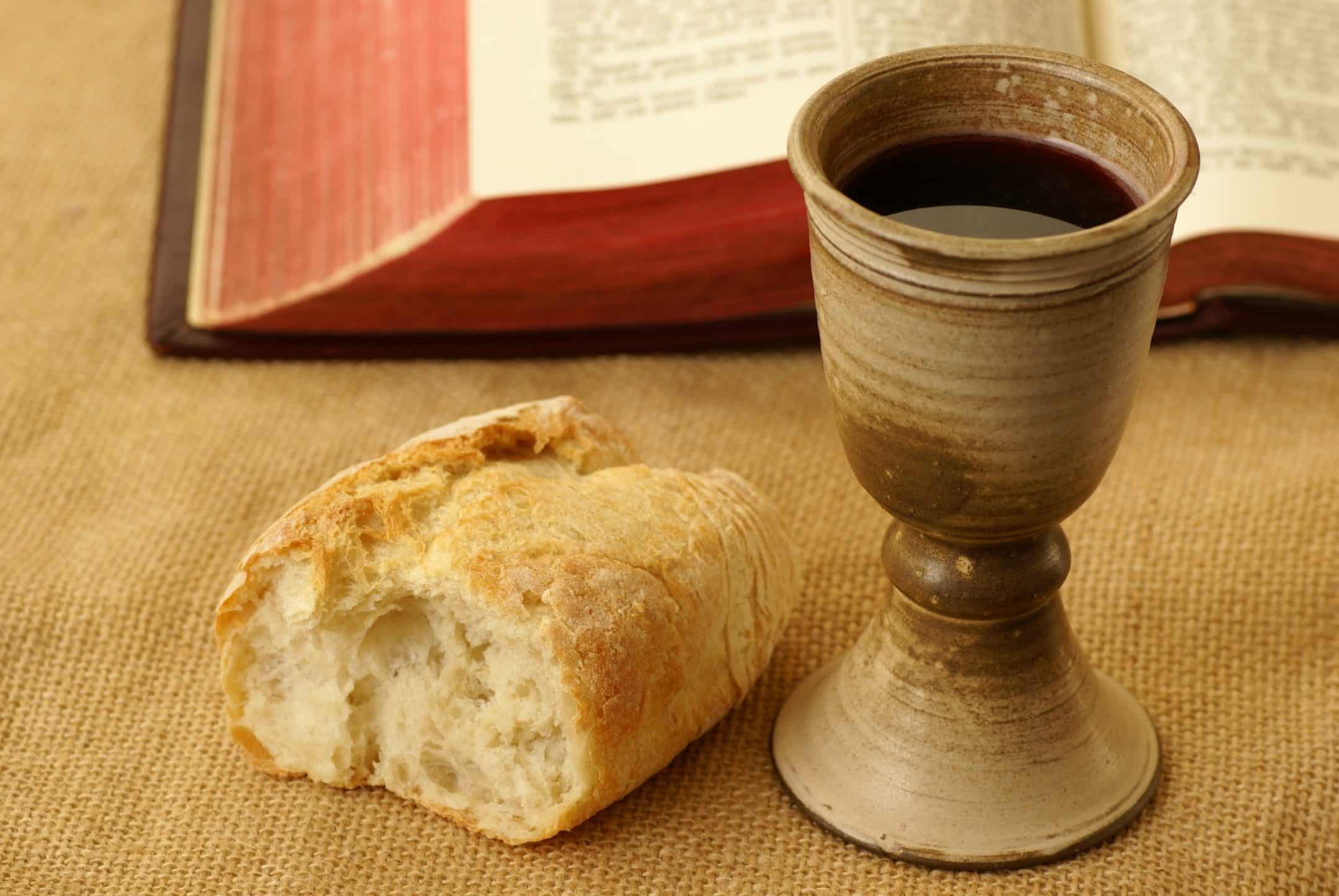 bible and bread and wine for communion