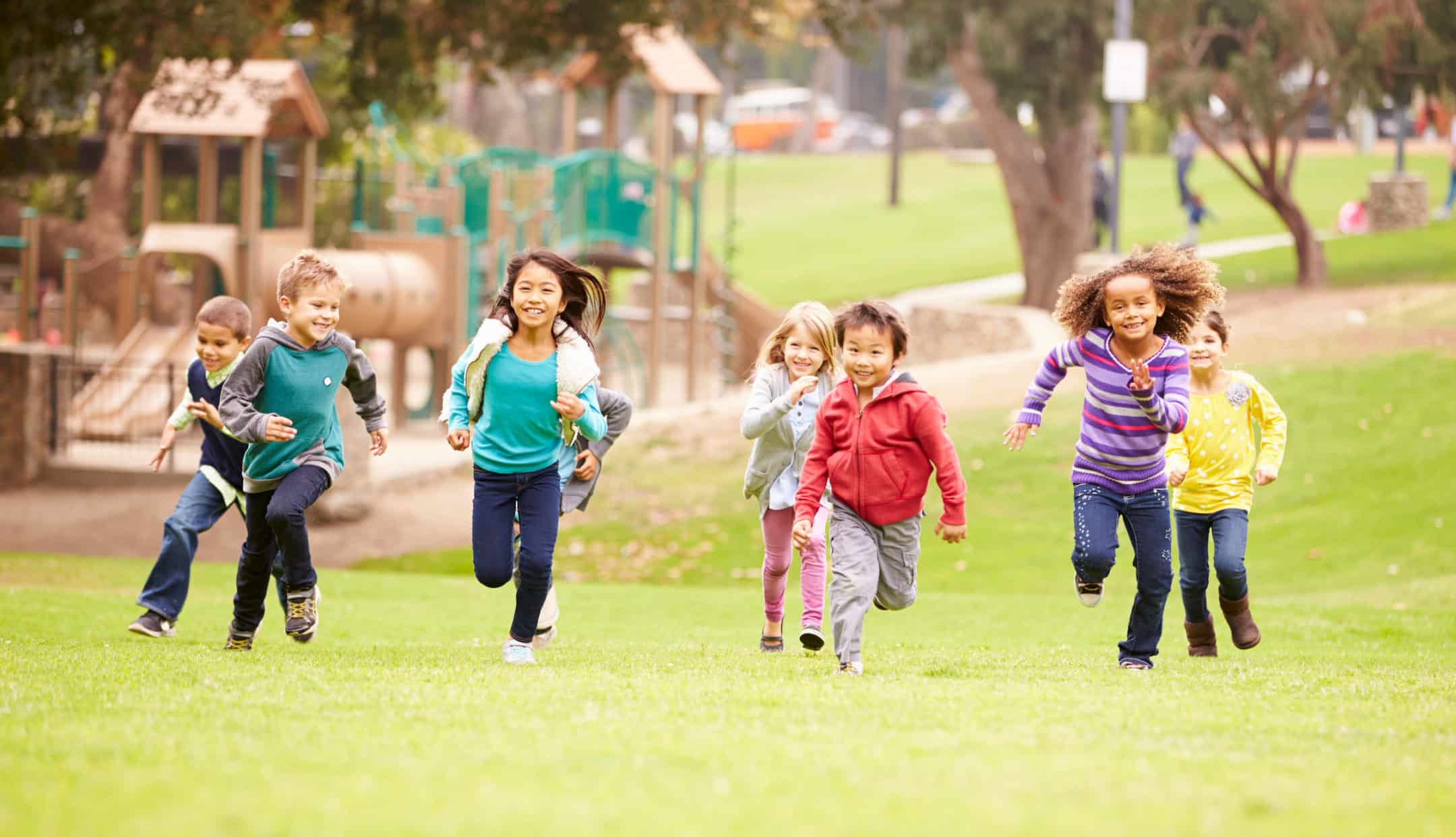 Group Of Young Children Running