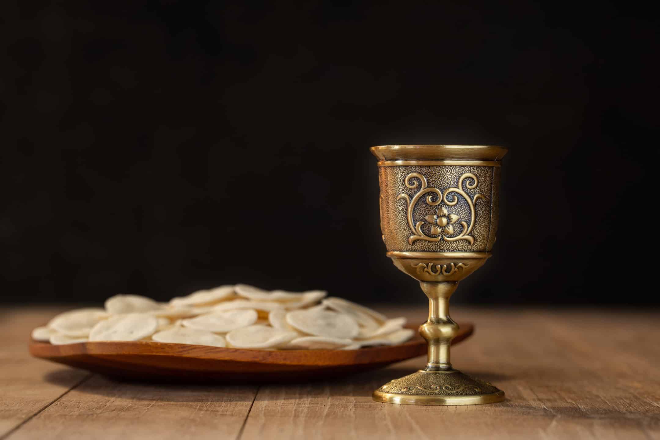 Holy communion on wooden table