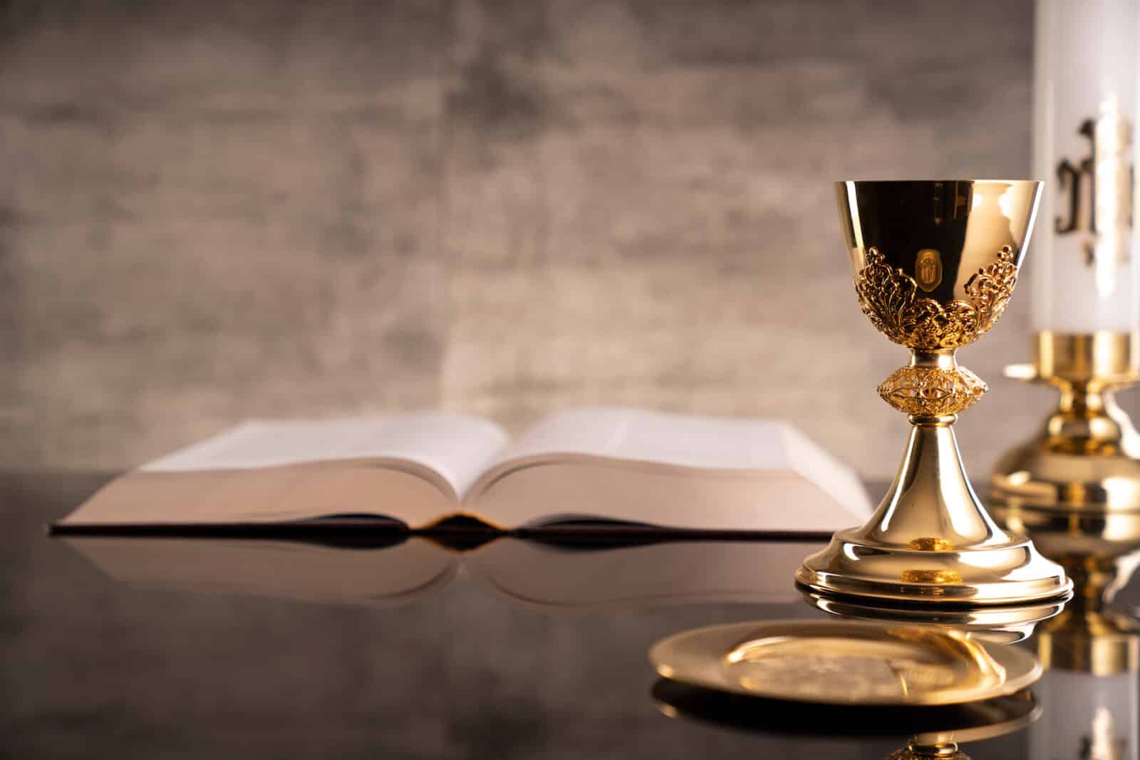 Golden Chalice and open bible at the altar.
