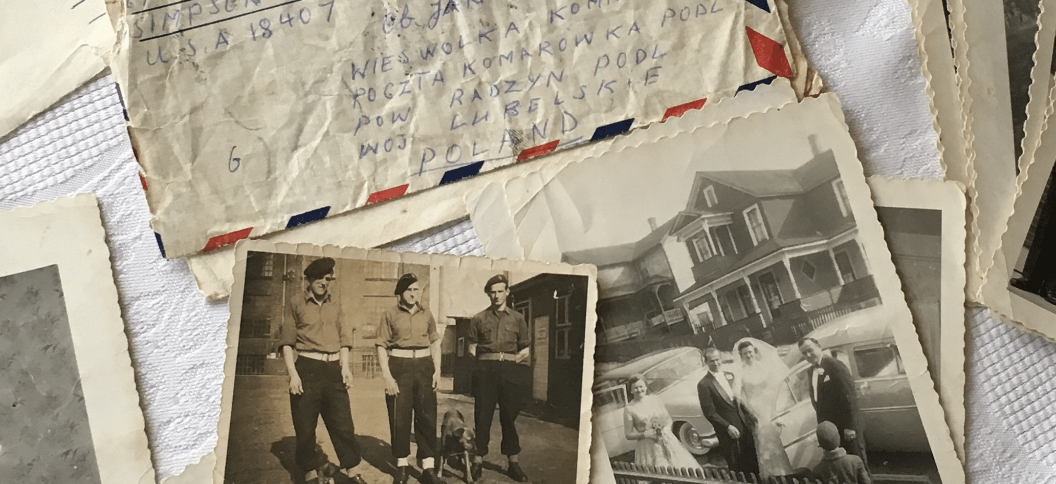 Collage of old photographs and handwritten letters, showing a wedding couple by a car and three men with a dog, layered with torn envelopes and paper.